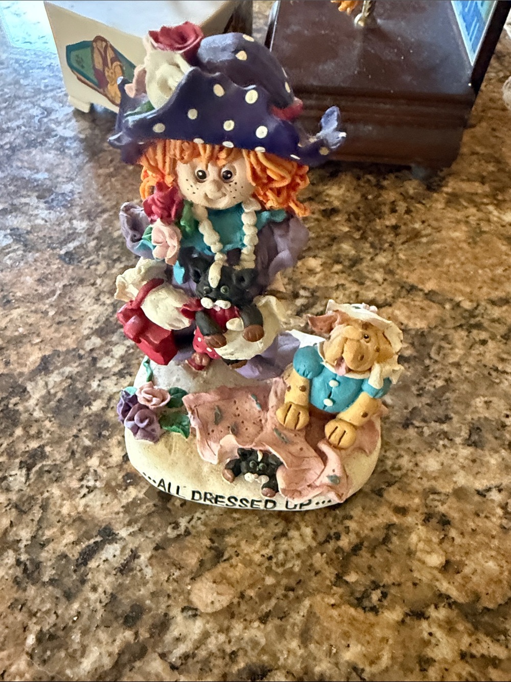 Whimsical Dressed-Up Figurine with Dog